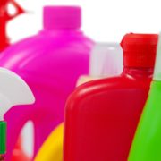 Various detergent containers arranged on white background