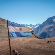 Argentina flag with Cerro Tolosa Mountain in Cordillera de Los Andes - Mendoza Province, Argentina