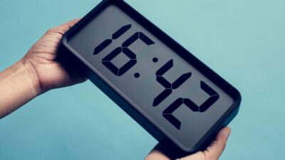 Digital clock on blue background