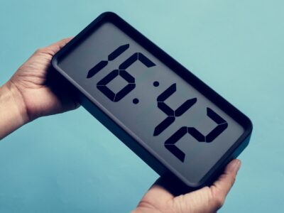 Digital clock on blue background