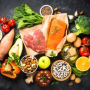 Healthy food products at black background top view