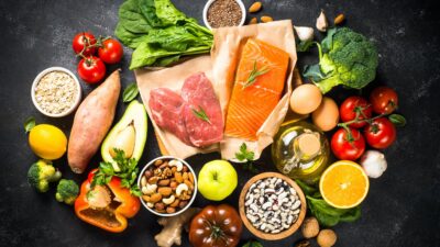 Healthy food products at black background top view