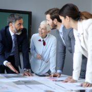 Creative business people working on business project in office